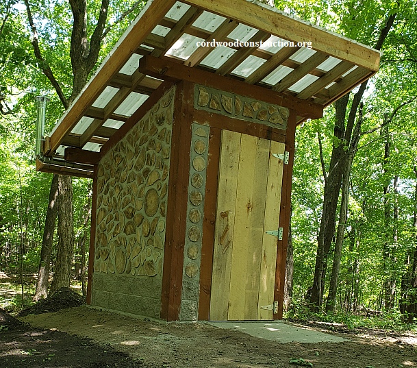 Cordwood Outhouse at Rune Stone Park in Minnesota